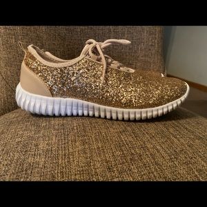 Gold women’s glitter tennis shoes